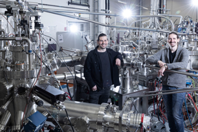 Dr. Peter Schüffelgen (left) and Tobias Schmitt (right) in front of the NanoCluster at Forschungszentrum Jülich where core components of the hybrid qubit were fabricated in an ultra-high vacuum.

CREDIT
Forschungszentrum Jülich / Sascha Kreklau